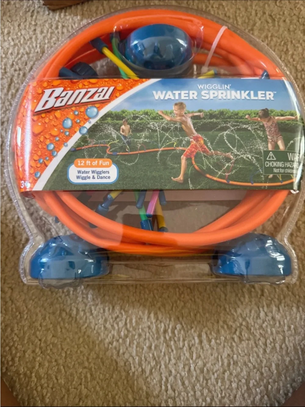 Banzai Wigglin' Water Sprinkler for Kids - Orange and Blue